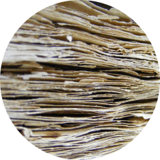 Close up of a stack of papers

AI-generated content may be incorrect.